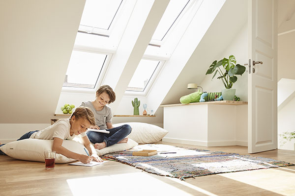 Children beneath roof window