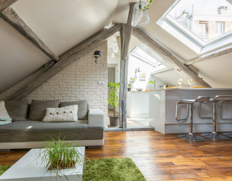 An attic conversion in an apartment including 2 VELUX roof windows.