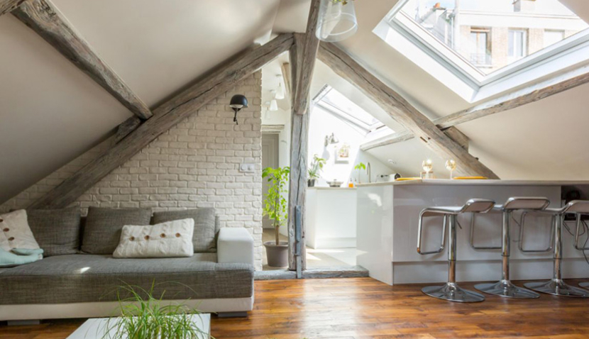 An attic conversion in an apartment including 2 VELUX roof windows.