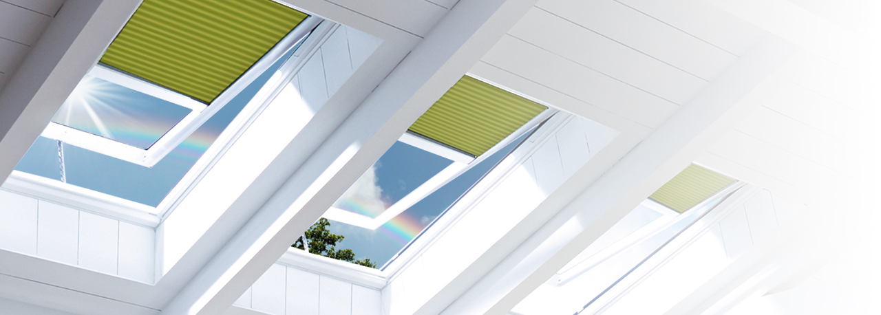 Blinds in vented skylights