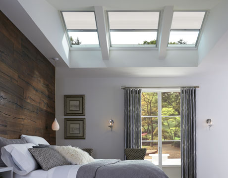 VELUX Light filtering single pleated blind controlling the amount of daylight in their bedroom