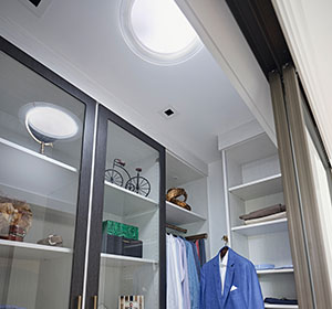 Closet with VELUX Sun Tunnel Skylights