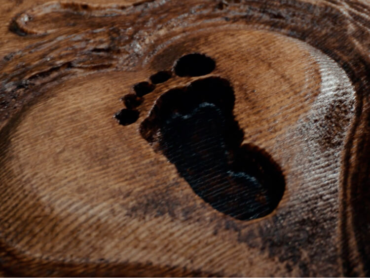 Footprint on a wooden surface
