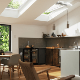 Image of bright kitchen with three VELUX roof windows installed