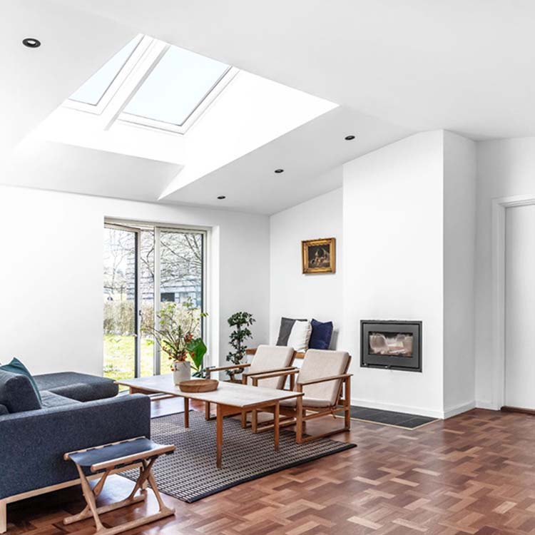 bright living room with VELUX rooflights in the ceiling