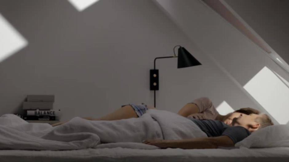 Image from video with to people sleeping