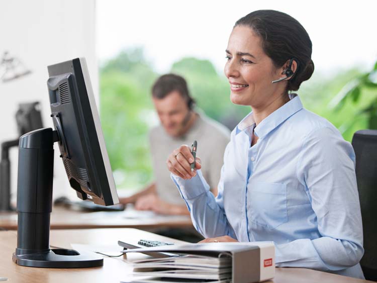 VELUX advisor working at their desk
